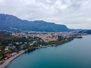 Aerial city landscape of Lecco village in Lake Como Italian Alps during fall in Lombardy