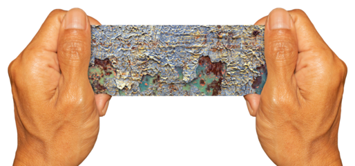 Man Hand Holding Metal Texture Pieces on Transparent Background. Ideal for Text Space or Creative Project.