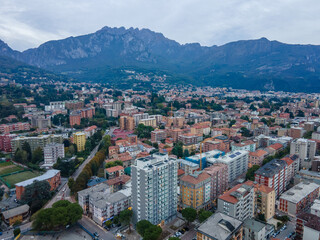 Aerial city landscape of Lecco village in Lake Como Italian Alps during fall in Lombardy