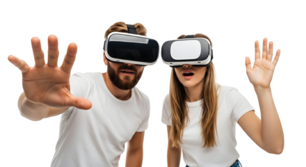 Immersed young couple enjoys virtual reality, wearing advanced headsets and interacting with a digital world, showcasing the future of interactive technology and entertainment