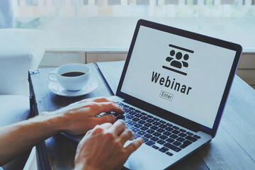 webinar online, web conference, internet education concept, word webinar on the screen of computer
