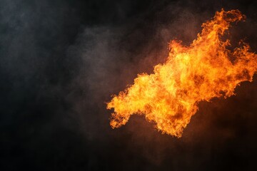 Explosive fire effect with glowing flames and smoke creating dramatic heat energy in darkness.