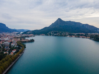Aerial city landscape of Lecco village in Lake Como Italian Alps overcast fall day in Lombardy