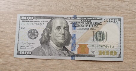 American one hundred dollar paper banknote. Hundred USD cash macro view. 100 Dollar Cash. Hundred Dollar Closeup. 100 USD Bills. Concept Finance Business Investment Success. - Powered by Adobe