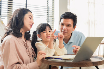 Dad, Mom, and daughter enjoy a moment of joyful homework on the sofa, a peaceful scene of family togetherness at home. They embrace a cheerful lifestyle, making study an exciting part of life