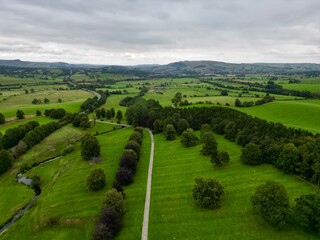Aerial view of green fields and countryside in Skipton North Yorkshire England. 
