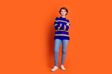 Photo of cute pretty lovely woman wear stylish blue clothes crossed hands empty space isolated on...