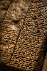 A close-up of ancient cuneiform tablets, showcasing the earliest form of writing, symbolizing Mesopotamia's profound historical legacy.