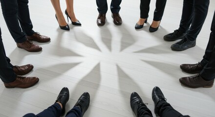 Group of People's Feet in Circle on White Floor with Star Shadow