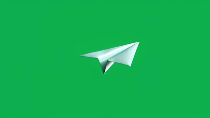 Animation of a white paper airplane flying against a vibrant green screen background, ideal for travel, communication, or creative projects