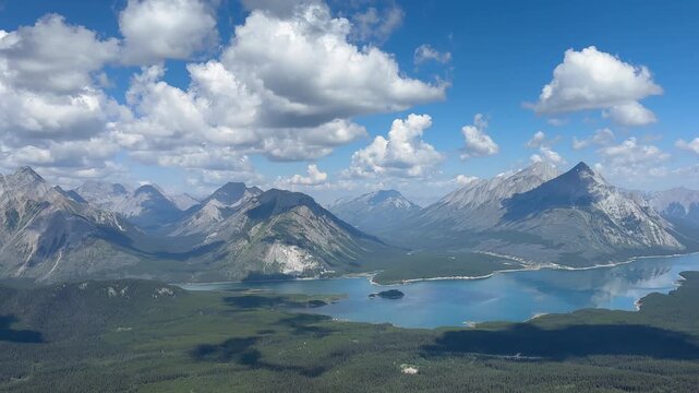 Drone view sweeping right to left from Tent Ridge in Kananaskis, Alberta, revealing rugged peaks
