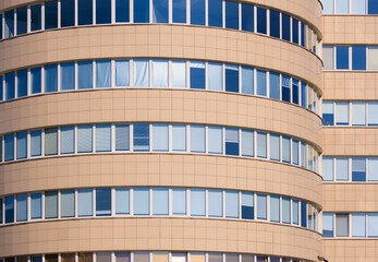Cityscape on a sunny day, modern buildings and houses 