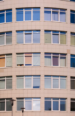 Cityscape on a sunny day, modern buildings and houses 