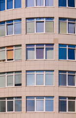 City view, modern buildings and skyscrapers against the blue sky.