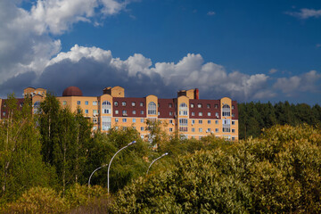 City view, modern buildings and skyscrapers against the blue sky.