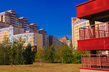 City view, modern buildings and skyscrapers against the blue sky.