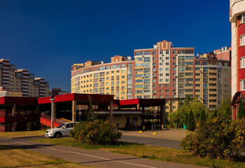 City view, modern buildings and skyscrapers against the blue sky.