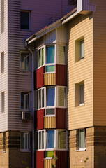 City view, modern buildings and skyscrapers against the blue sky.