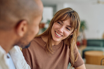 Business partners engaging in a collaborative discussion about a project during an informal meeting...