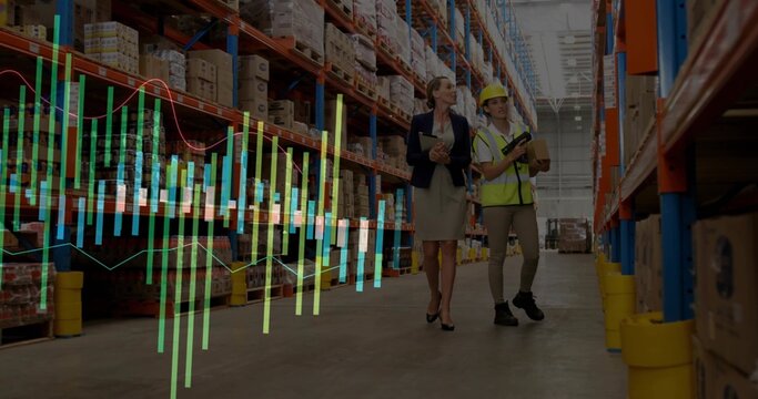 Walking manager and worker viewing data overlay in warehouse aisle, with tablet scanner and package - Powered by Adobe