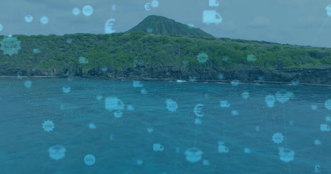 Displaying volcanic island peak rising over coastal turquoise sea, featuring digital overlay icons