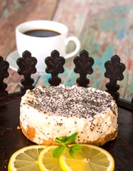 Lemon poppy seed cheesecake slice, coffee