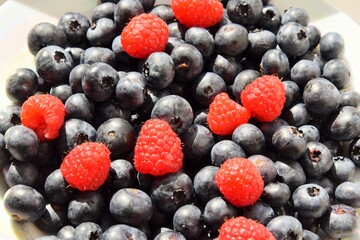 Healthy Eating. Blueberries and Raspberries on a Plate
