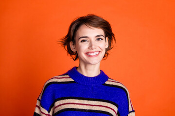 Photo of cute pretty lovely woman wear stylish clothes isolated on orange color background