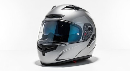 Fototapeta premium Sleek silver motorcycle helmet angled, visor down