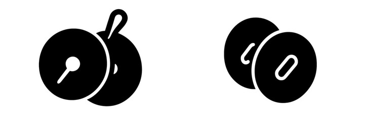 Weight plates on a gym floor ready for a strength training session in a fitness center