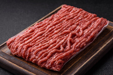 Raw ground beef or pork, fresh meat for burgers or other dishes. Raw beef minced meat