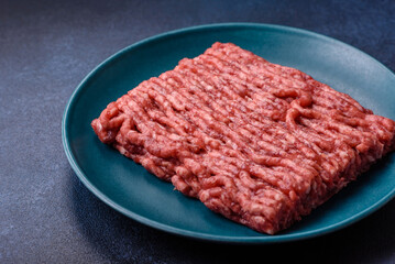 Raw ground beef or pork, fresh meat for burgers or other dishes. Raw beef minced meat