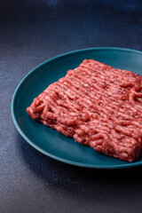 Raw ground beef or pork, fresh meat for burgers or other dishes. Raw beef minced meat