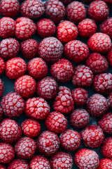 frozen raspberries ice background