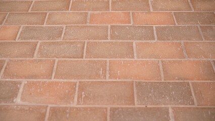 Brick pavement surface showing wear and tear
