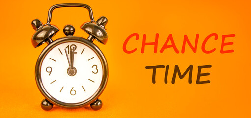 Chance time symbol. Concept word Chance time on beautiful orange paper. Beautiful black alarm...