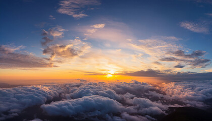 Fototapeta premium Dramatic Sunset Sky Panorama During Golden Hour Cloud Scape Serene Sky Path Above Raising Clouds At Sunset