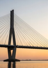 Obraz premium Architectural a cable stayed bridge at sunset, evoking feelings of progress