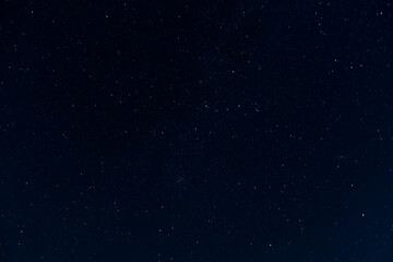 Night sky scattered stars. Celestial canvas dark blue background with glimmering star points cosmos...