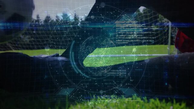 Foot tapping soccer ball overlaying keeper diving securing it defending goal opponent stepping over