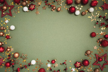 Christmas and New Year holiday background from festive decoration top view. Xmas ornament composition for greeting card.