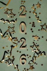 2026 Happy New Year golden glittering numbers top view.