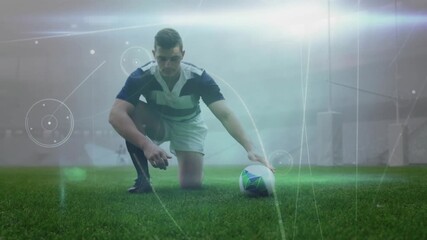 Rugby player kneeling tying cleats triggers lines swirling lifting ball then jogging for kickoff - Powered by Adobe