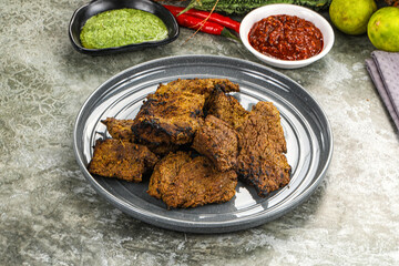 Grilled beef barbecue with spises