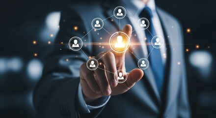 Businessman interacts with a digital network of people icons and connections