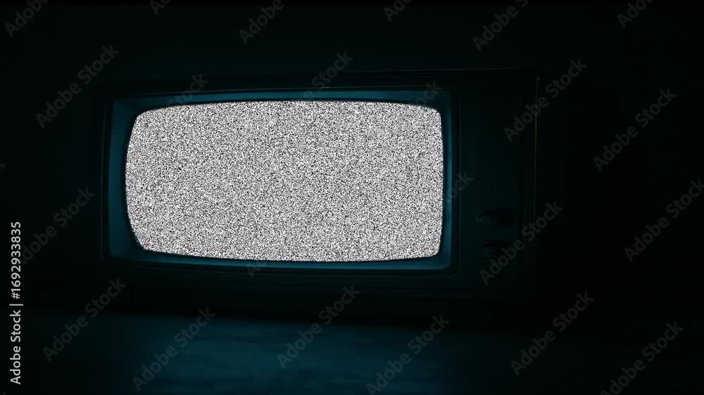 Aufkleber vintage crt television with white noise static and no signal error in a dark room, retro tech concep