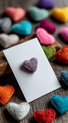 Colorful Felt Hearts on Display With a Note Card in a Creative Arrangement