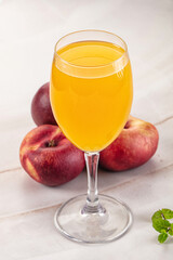Vitamin beverage - peach juice glass