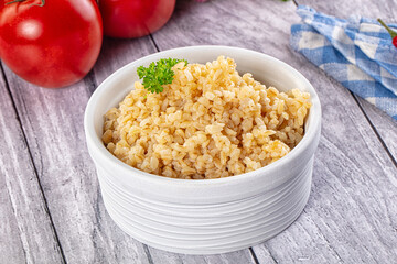 Vegan cuisine - boiled bulgur garnish