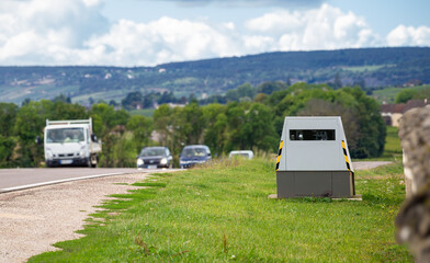 Speed Camera on Rural Road of Burgundy, France, with Approaching Vehicles